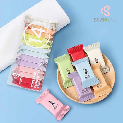 14pcs/Tube Colorful Compressed Coin Tissues (7 Colors) – Portable Expandable Magic Towels – Travel Kit & Promotional Gift (OEM)